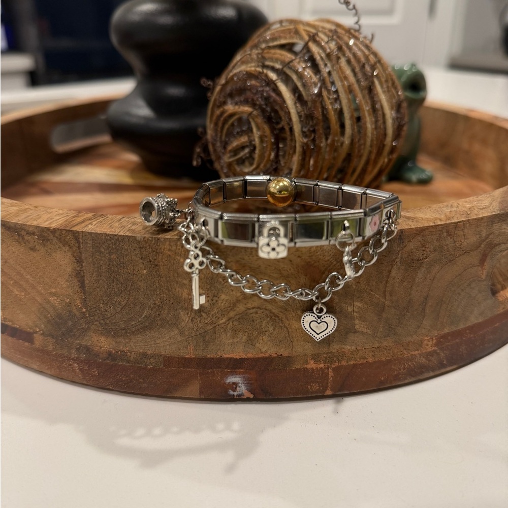 Silver Motion or Sea Sickness Charm Bracelet Valentine/Love Theme